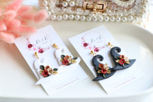 Load image into Gallery viewer, Witch Hat Polymer Clay Earrings – Handmade Halloween Earrings | Spooky Cute Statement Jewelry | KeandKi Designs (Black Flower)