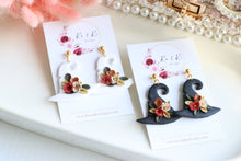 Load image into Gallery viewer, Witch Hat Polymer Clay Earrings – Handmade Halloween Earrings | Spooky Cute Statement Jewelry | KeandKi Designs (Black Flower)