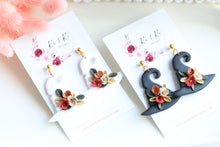 Load image into Gallery viewer, Witch Hat Polymer Clay Earrings – Handmade Halloween Earrings | Spooky Cute Statement Jewelry | KeandKi Designs (White Flower)