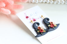 Load image into Gallery viewer, Witch Hat Polymer Clay Earrings – Handmade Halloween Earrings | Spooky Cute Statement Jewelry | KeandKi Designs (Black Flower)