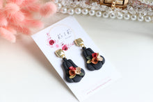 Load image into Gallery viewer, Pumpkin Floral Polymer Clay Earrings – Handmade Autumn Halloween Earrings | Fall Floral Jewelry | KeandKi Designs ( Tri color Black Red teracotta and beige Floral )