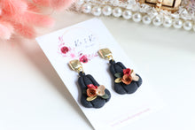 Load image into Gallery viewer, Pumpkin Floral Polymer Clay Earrings – Handmade Autumn Halloween Earrings | Fall Floral Jewelry | KeandKi Designs ( Tri color Black Red teracotta and beige Floral )