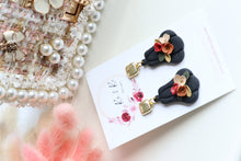 Load image into Gallery viewer, Pumpkin Floral Polymer Clay Earrings – Handmade Autumn Halloween Earrings | Fall Floral Jewelry | KeandKi Designs ( Tri color Black Red teracotta and beige Floral )