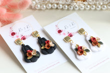 Load image into Gallery viewer, Pumpkin Floral Polymer Clay Earrings – Handmade Autumn Halloween Earrings | Fall Floral Jewelry | KeandKi Designs ( Tri color Black Red teracotta and beige Floral )