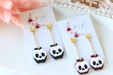 Load image into Gallery viewer, Apple Skull Polymer Clay Earrings – Poison Apple Halloween Earrings | Handmade Spooky Cute Jewelry | KeandKi Designs (Marroon)