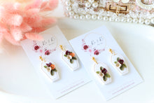 Load image into Gallery viewer, Coffin Floral Polymer Clay Earrings – Gothic Floral Halloween Earrings | Handmade Statement Jewelry | KeandKi Designs ( Pink Orange color)
