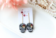 Load image into Gallery viewer, Floral Embossed Skull Floral Dangle Polymer Clay Earrings – Handmade Gothic Floral Earrings | Spooky Elegant Halloween Jewelry | KeandKi Designs