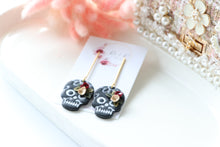 Load image into Gallery viewer, Floral Embossed Skull Floral Dangle Polymer Clay Earrings – Handmade Gothic Floral Earrings | Spooky Elegant Halloween Jewelry | KeandKi Designs