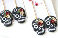 Load image into Gallery viewer, Floral Embossed Skull Floral Dangle Polymer Clay Earrings – Handmade Gothic Floral Earrings | Spooky Elegant Halloween Jewelry | KeandKi Designs