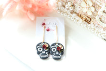 Load image into Gallery viewer, Embossed Skull Floral Dangle Polymer Clay Earrings – Handmade Gothic Floral Earrings | Spooky Elegant Halloween Jewelry | KeandKi Designs