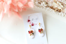 Load image into Gallery viewer, Cross Floral Polymer Clay Earrings – Handmade Floral Statement Earrings | Christian Jewelry | KeandKi Designs ( White Florals )