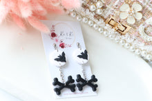 Load image into Gallery viewer, Bat and Bone Polymer Clay Earrings – Handmade Halloween Earrings | Spooky Gothic Statement Jewelry | KeandKi Designs