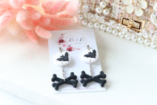 Load image into Gallery viewer, Bat and Bone Polymer Clay Earrings – Handmade Halloween Earrings | Spooky Gothic Statement Jewelry | KeandKi Designs