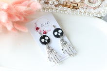 Load image into Gallery viewer, Tiny Skull Head & Steel Skeletal Hand Dangle Earrings – Handmade Gothic Halloween Jewelry | Polymer Clay Skull Earrings | KeandKi Designs